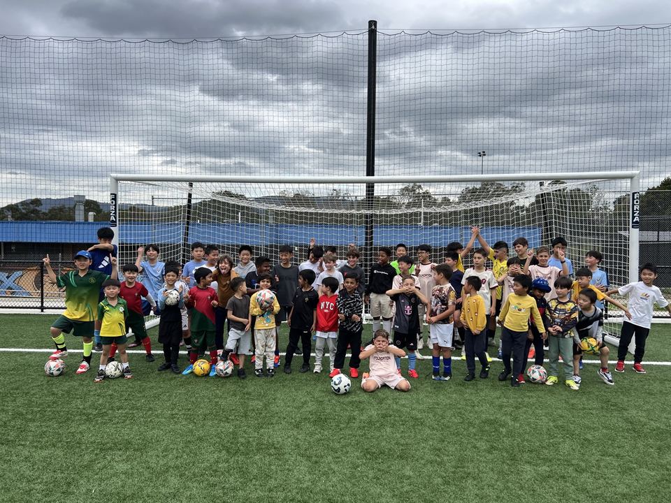 The squad in front of the goal after a session
